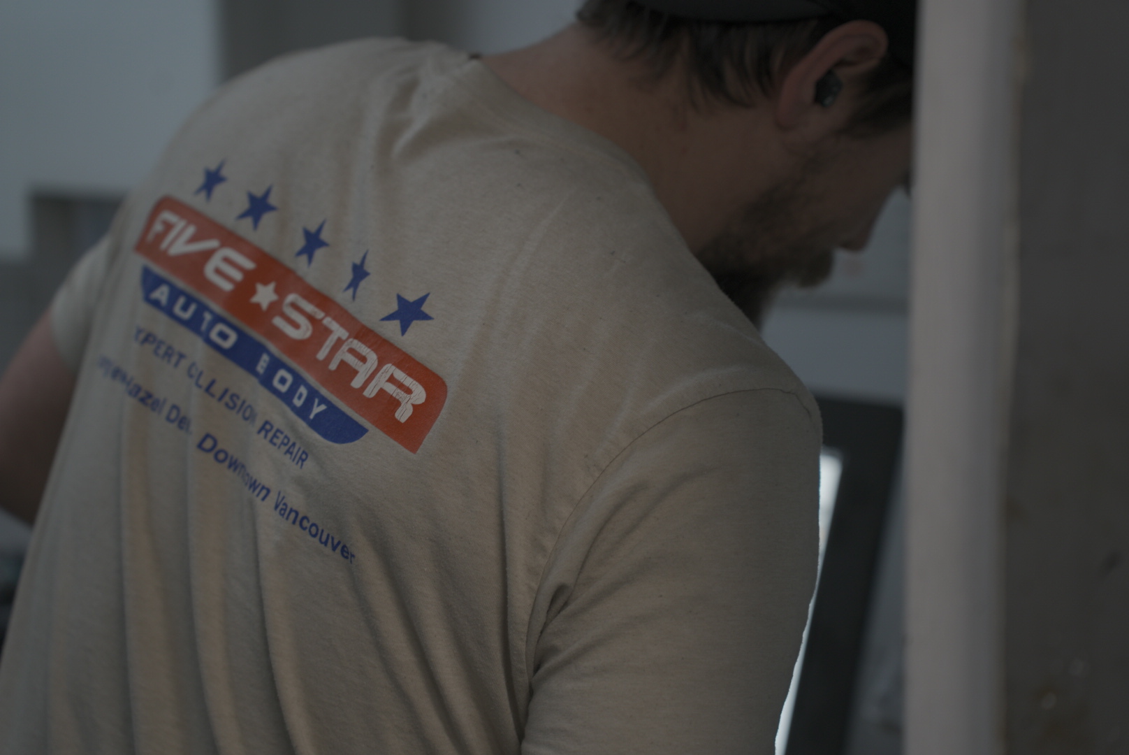 Five Star Auto Body team collaborating on a vehicle repair project in Vancouver WA