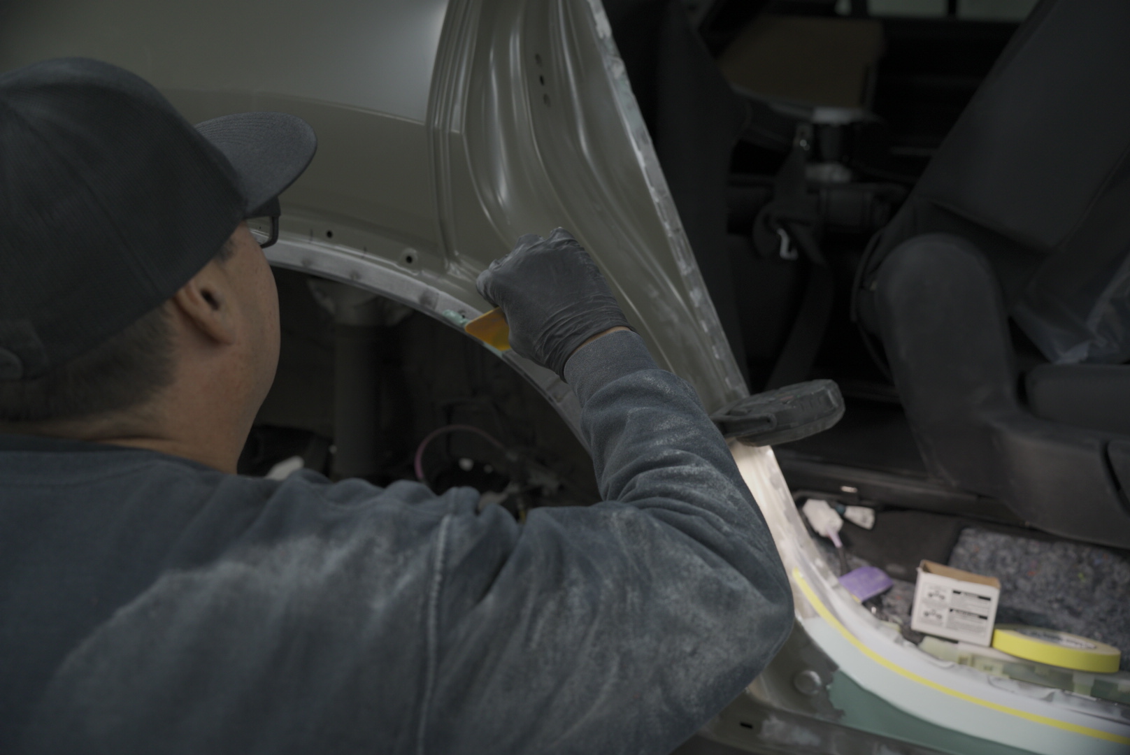 Five Star Auto Body technician performing precision sanding work during structural repair